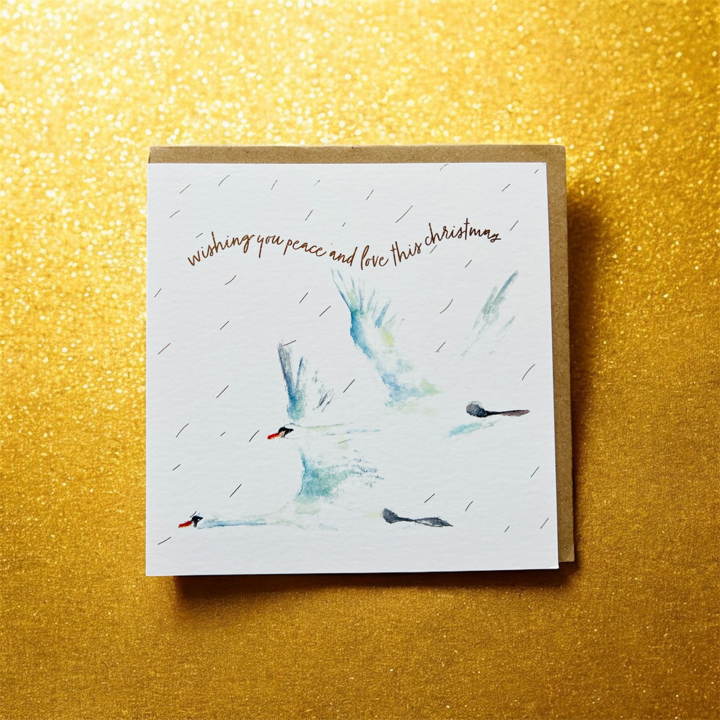 Christmas Flying Swans 'Wishing you peace and love this Christmas' Greeting Card- by Sarah Epsom